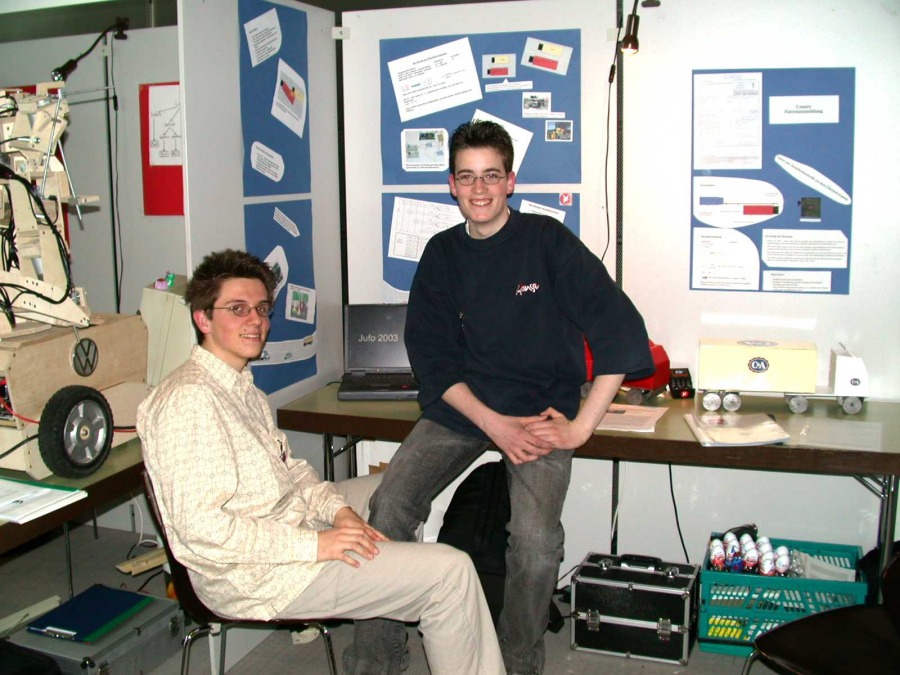 Jens and Florian in front of their exhibit at the state contest "Jugend forscht"